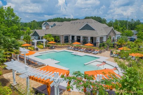 Sparkling swimming pool and spacious sundeck at The Oxmoor in Birmingham, AL